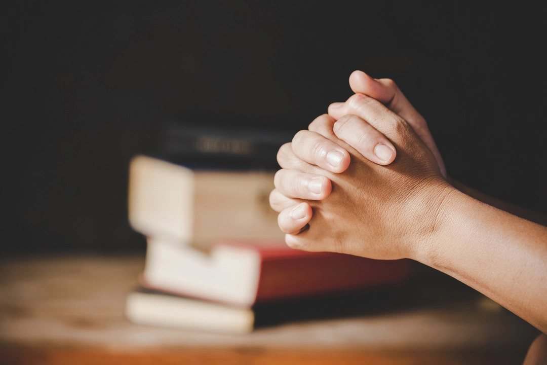 spirituality-religion-hands-folded-prayer-holy-bible-church-concept-faith